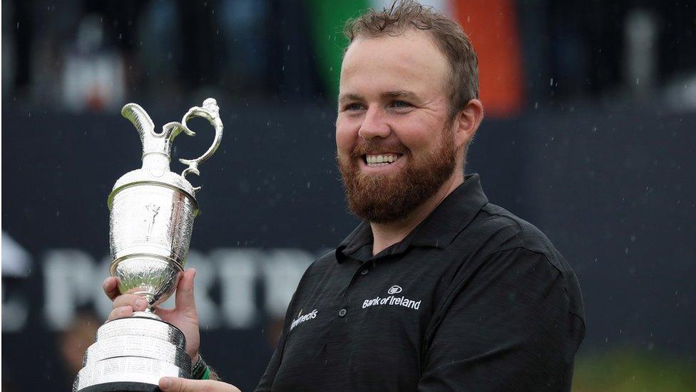 Shane Lowry of Ireland with the claret jug trophy as he celebrates winning the British Open Golf Championship at Royal Portrush, Northern Ireland, 21 July 2019.