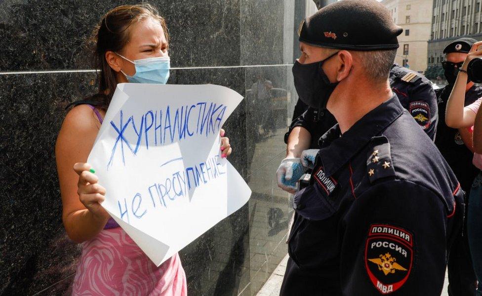 Protester confronting police over Safronov arrest in Moscow, 7 Jul 20