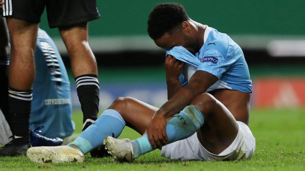 Manchester City's Raheem Sterling looks sad after the match