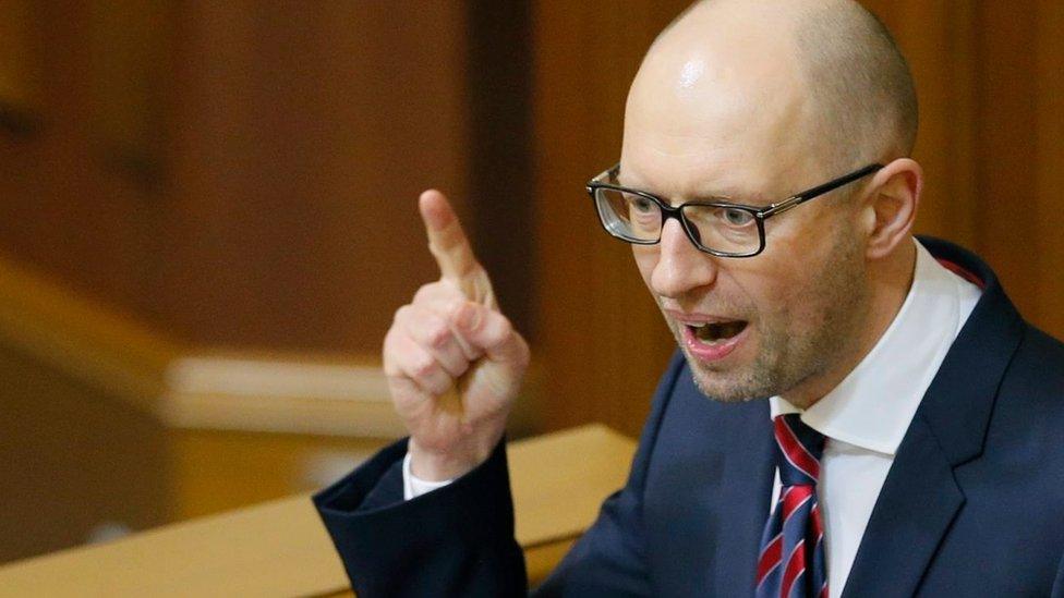 Ukrainian Prime Minister Arseniy Yatsenyuk gives his annual report at Parliament