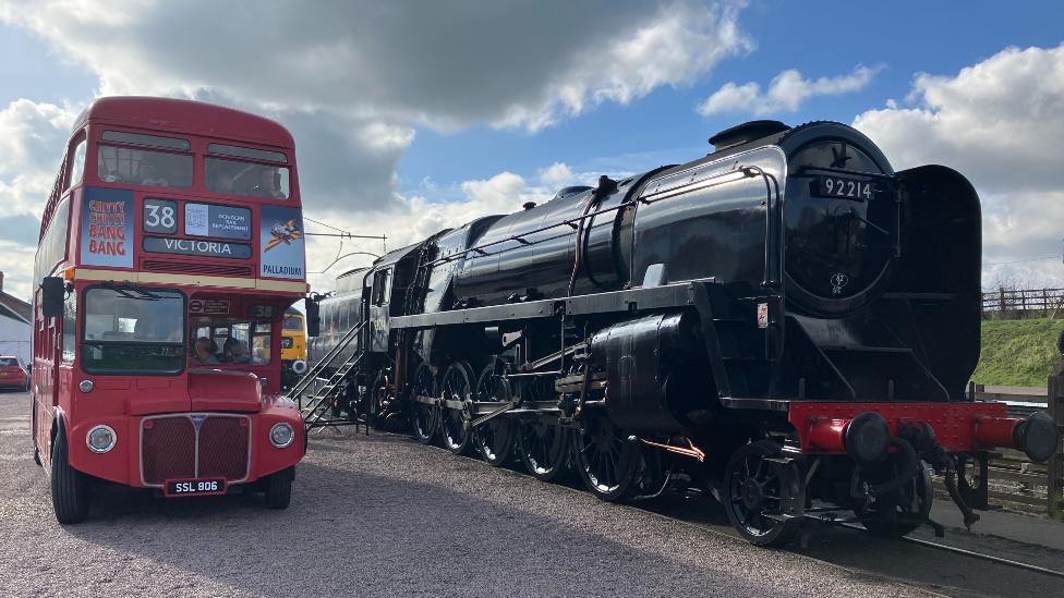 London Routemaster bus and steam train