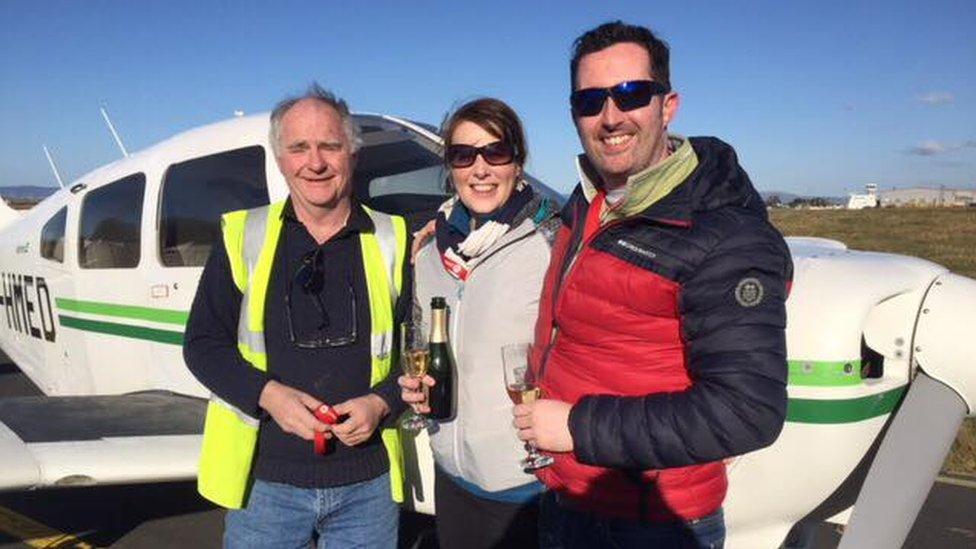 Pilot Eugene McShane joined in the champagne celebrations