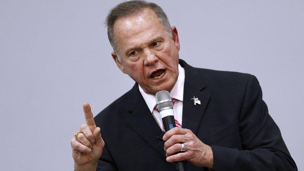 Republican Senate Candidate Roy Moore attends a service at the Walker Springs Road Baptist Church in Jackson, Alabama.