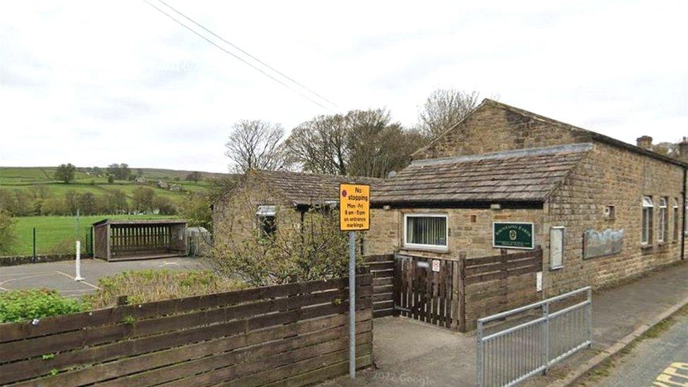 A photo of the outside of Fountains Earth CE Primary School