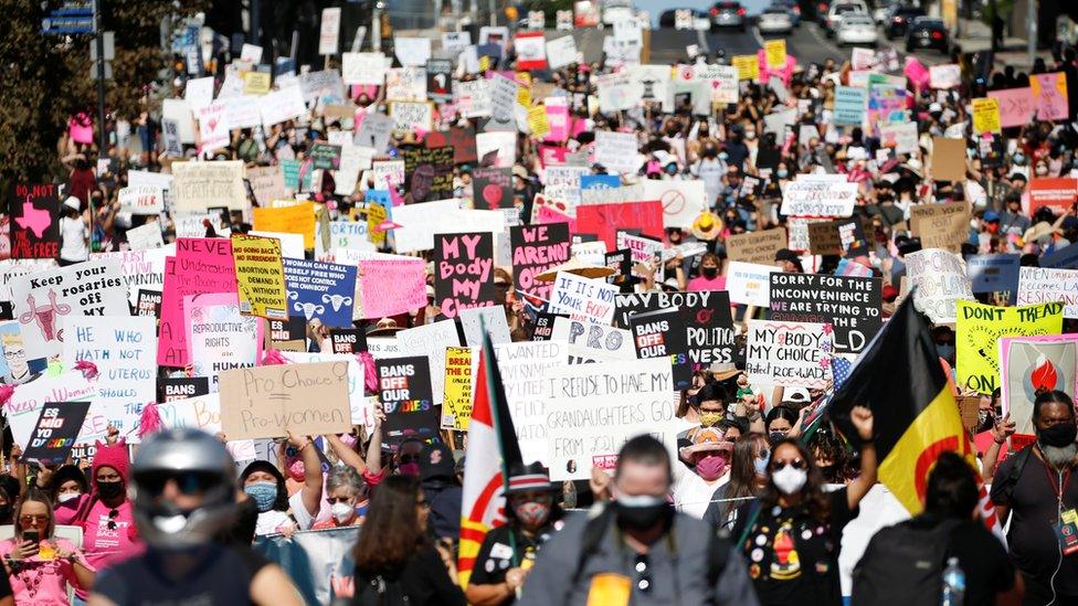 Protesters take part in the Women's March and Rally for Abortion Justice in Los Angeles on 2 October 2021