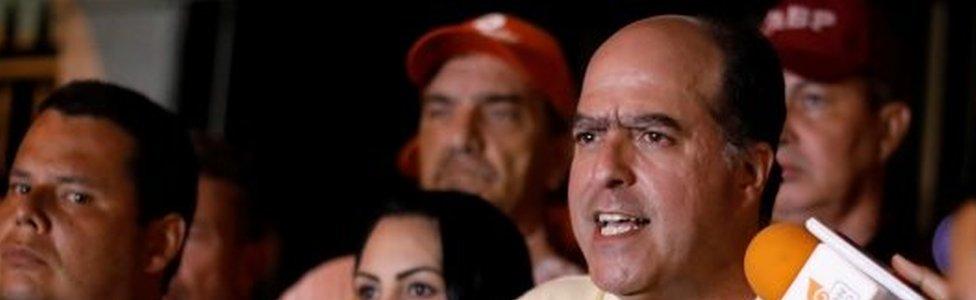 Julio Borges (right), President of the National Assembly and deputy of the Venezuelan coalition of opposition parties (MUD), talks to the media during a news conference in Caracas, Venezuela May 1, 2017.