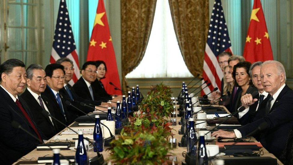 biden and xi and teams at table