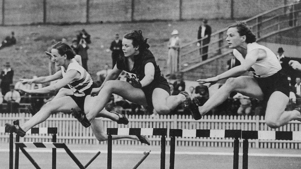 Women compete in the 80 metres hurdles at the 1938 British Empire Games in Sydney