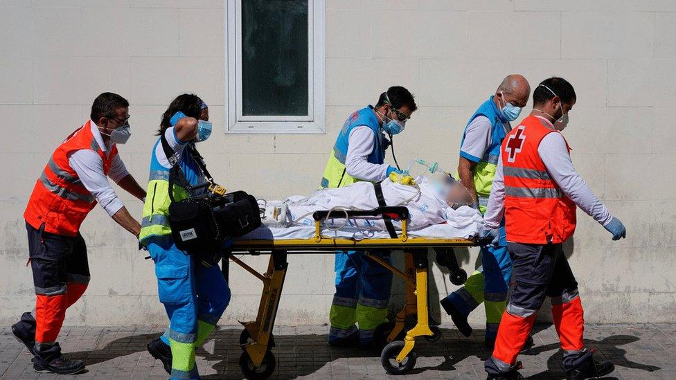 Health workers push a stretcher with a patient in the emergency unit at 12 de Octubre hospital amid the coronavirus disease (COVID-19) pandemic, in Madrid, Spain, September 2, 2020