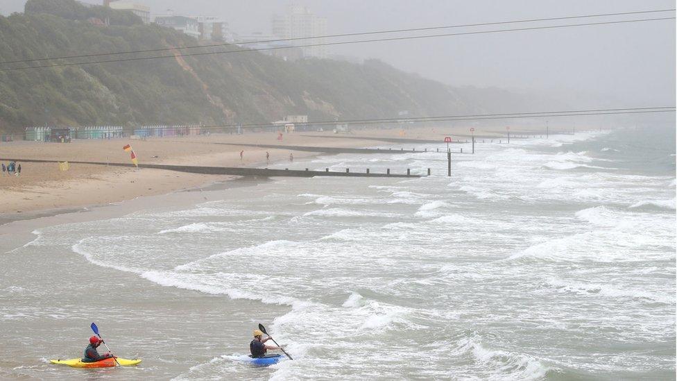 Kayakers off Bournemouth beach in Dorset