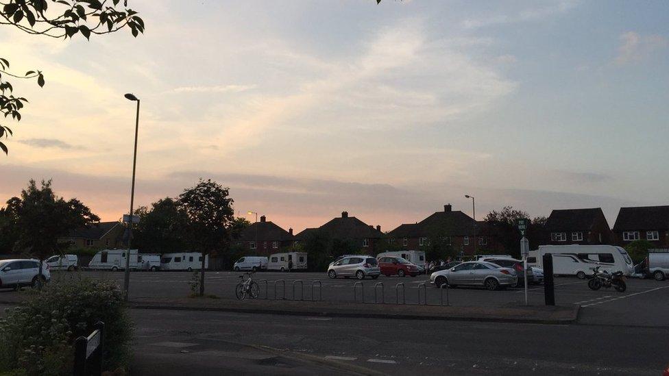 Travellers pitched up in Walton Park car park, Surrey, in June