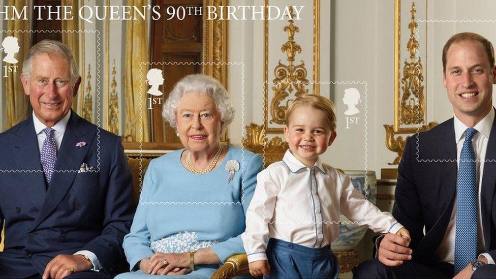 Prince George stands on foam blocks during a Royal Mail photo shoot for a stamp sheet to mark the Queen's 90th birthday. The sheet also features - Prince Charles, the Queen and Prince William