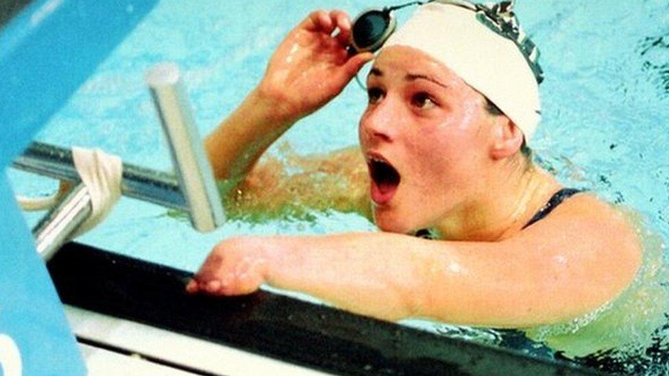 Sarah Storey stares at the clock after shattering her own 200m backstroke record by over six seconds in 1993