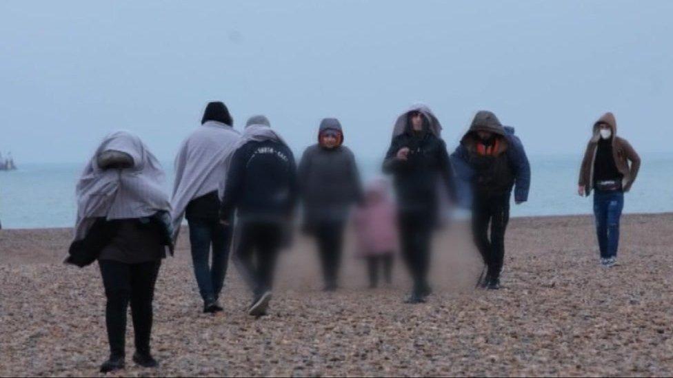 Migrants on Dungeness beach