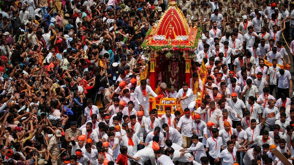 Hindu devotees pull the "Rath", or the chariot of Lord Jagannath, during the annual Rath Yatra, or chariot procession, in Ahmedabad, India.