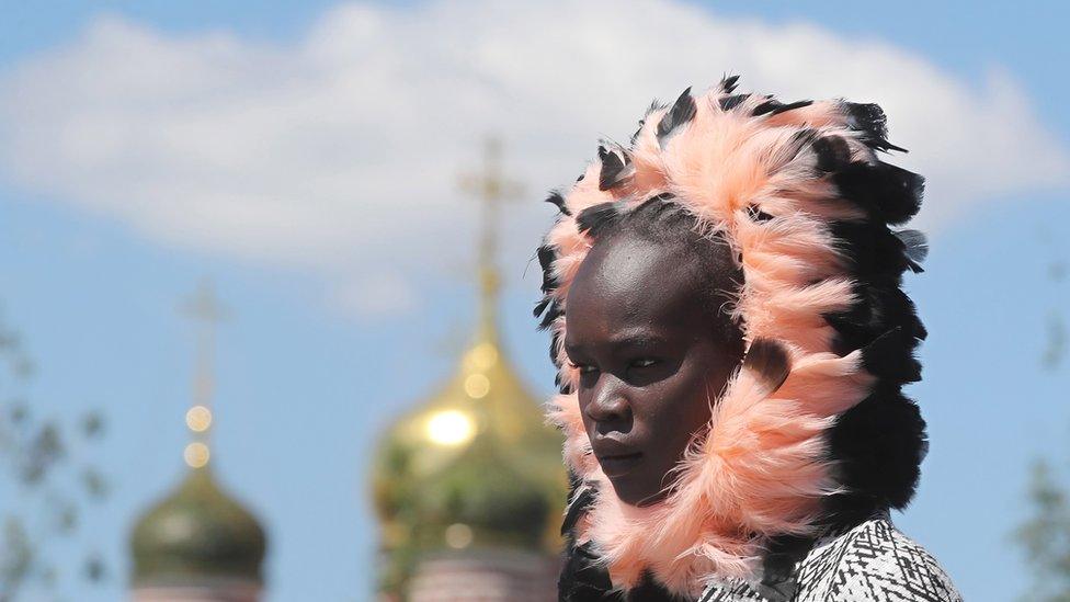 A model presents a creation by British Higher School of Art And Design during the Moscow Fashion Week at Zaryadye Park, in Moscow, Russia, 24 June 2022.