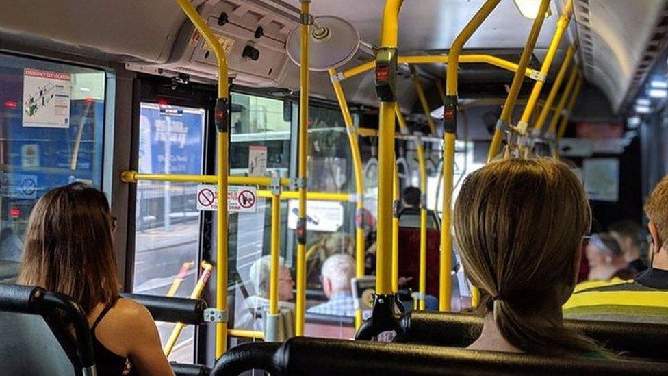 People sitting on a bus