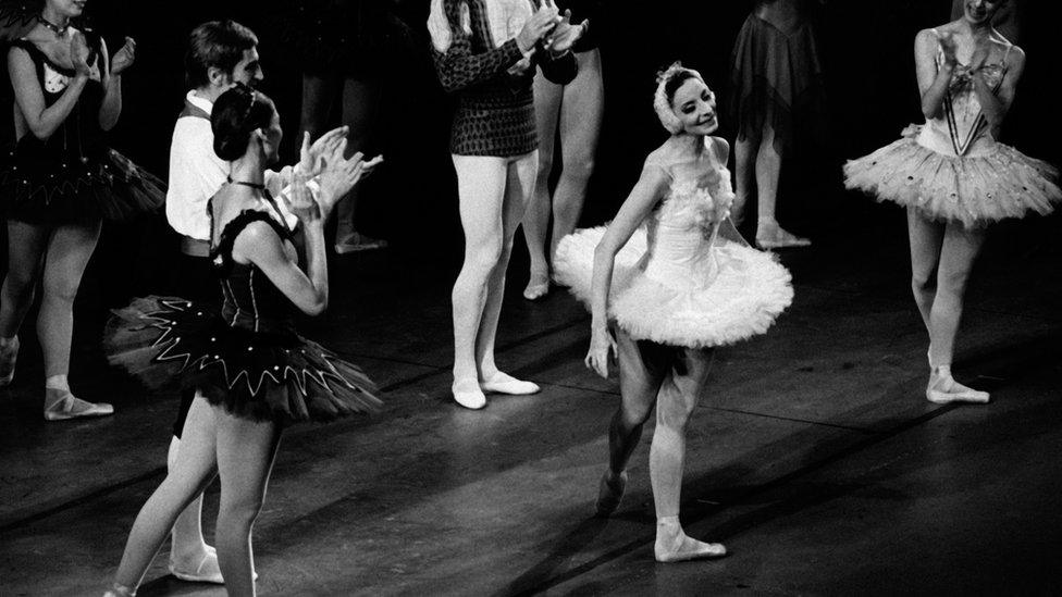 Alicia Alonso (centre-right) dances on stage in New York