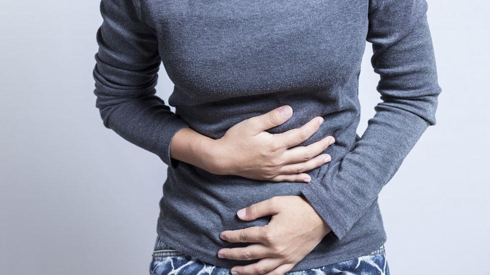 woman with stomach pain