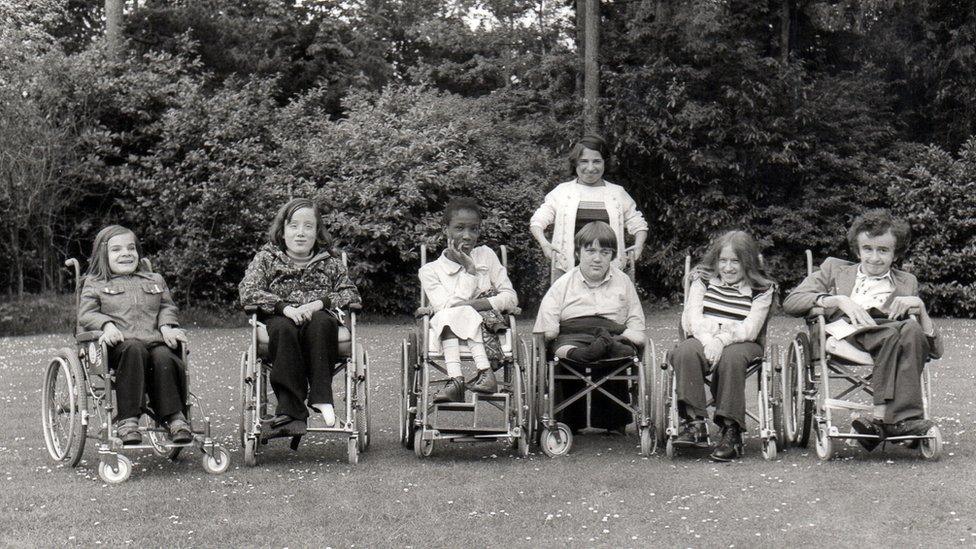 Seven young people from Banstead, six in wheelchairs