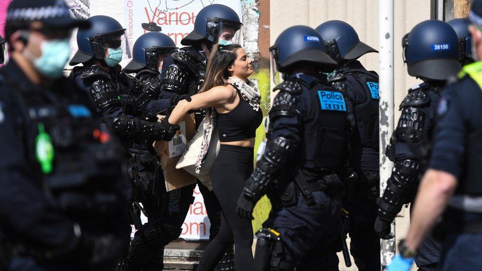 Protester being arrested at anti-lockdown demonstration in Melbourne