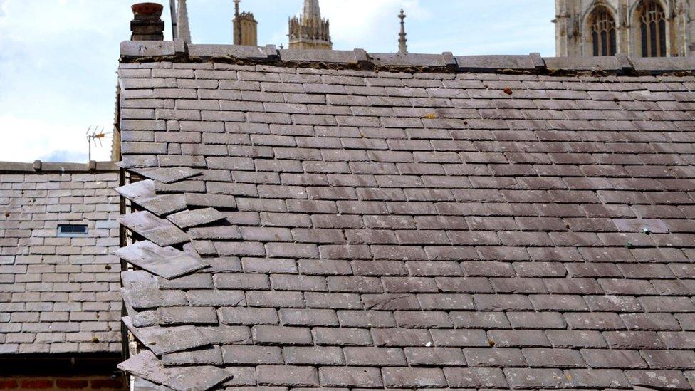 Damaged roof tiles