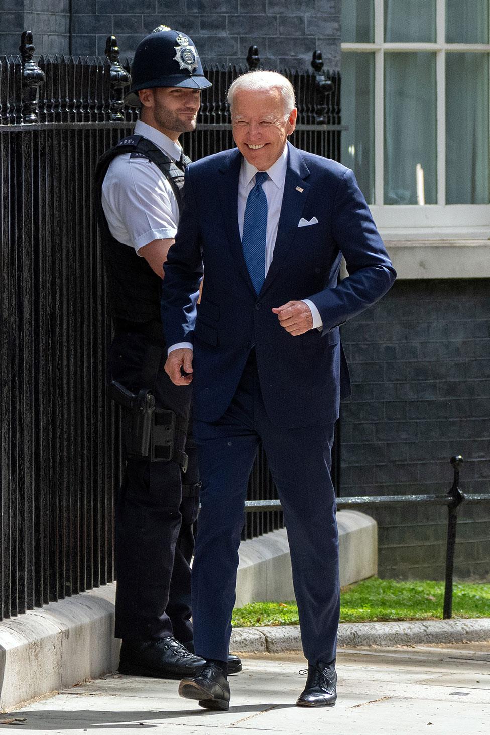 US President Joe Biden smiles as he arrives at 10 Downing Street to meet with British Prime Minister Rishi Sunak on 10 July 2023 in London, England