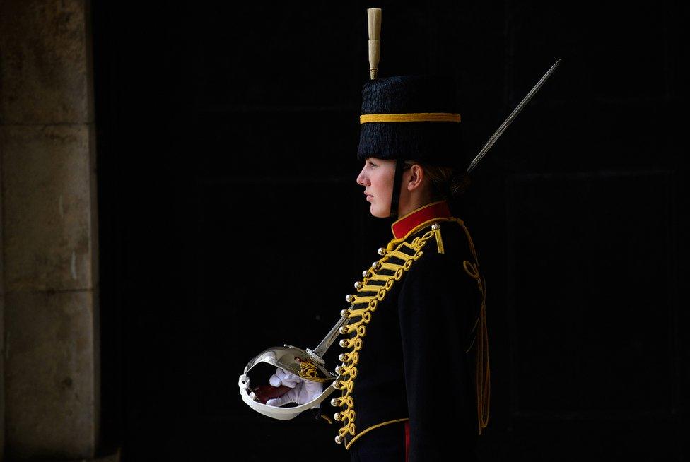 Soldier in uniform holding a sword