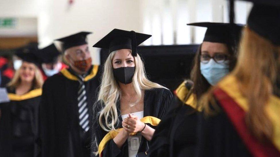 Graduates at a ceremony in Bolton, Lancashire