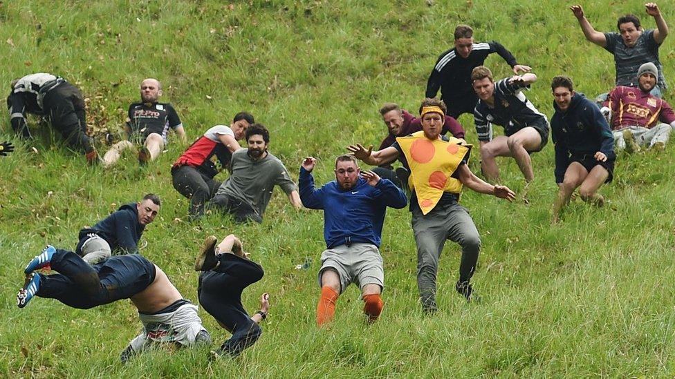 Cheese rolling on Cooper's Hill at Brockworth, Gloucestershire