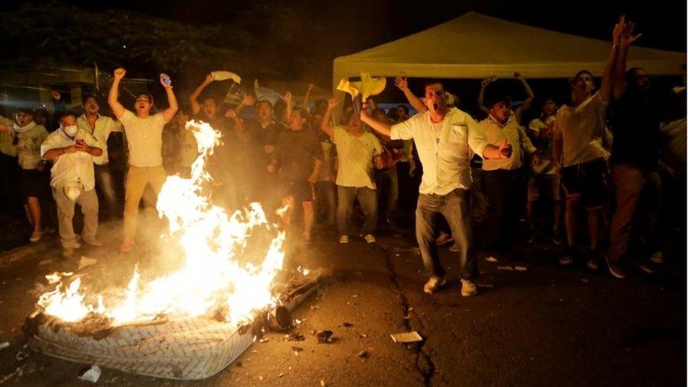 Supporters of Ecuadorean presidential candidate Guillermo Lasso demonstrate during national election day in Guayaquil, Ecuador, April 2, 2017.