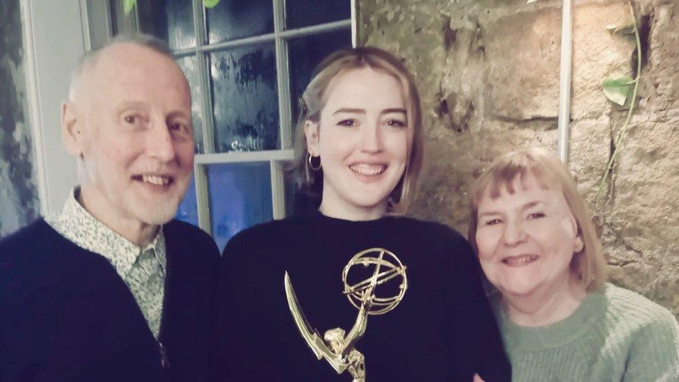 Ms Ellis with her parents Paul and Jan