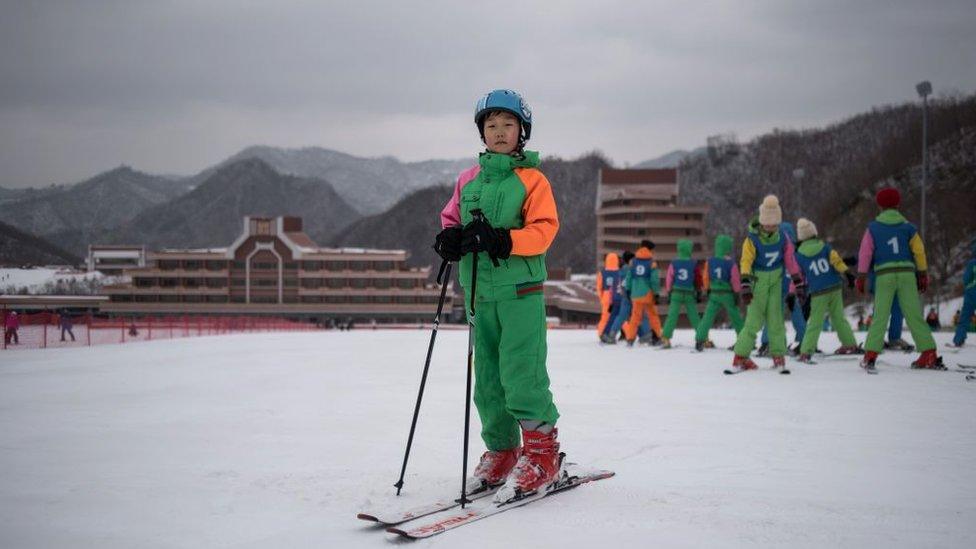 In this photo taken on February 19, 2017, Pak Han-Song, 11, poses for a portrait on a beginner's slope at the Masikryong