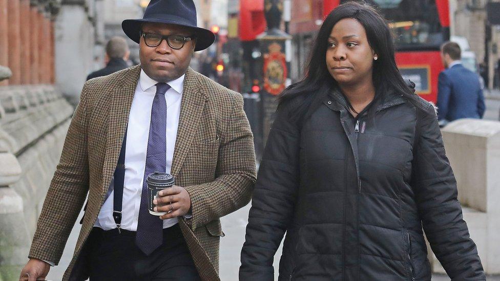 Isaiah Haastrup's father Lanre Haastrup and mother Takesha Thomas arrive at the High Court in London