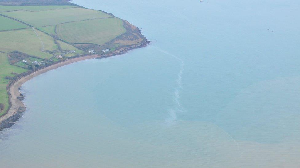 Oil trail at Milford Haven, Pembrokeshire