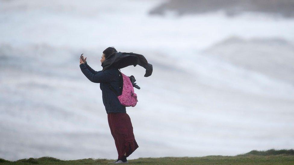 Woman on sea front