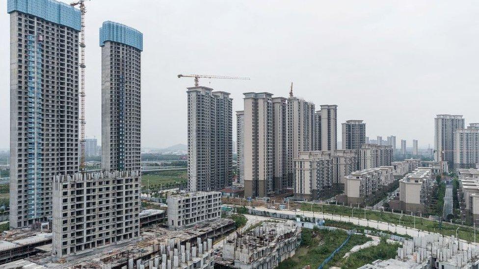 A housing complex under construction by Chinese property developer Evergrande is seen in Wuhan, in China's central Hubei province on September 28, 2023.