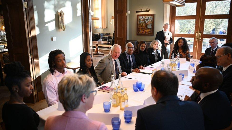 The Prince of Wales (centre) and Principal Lord Woolley attend a session on "Get In Cambridge" during a visit to Homerton College at the University of Cambridge, to discuss access to education and learn of the college"s vision to welcome and support students from diverse backgrounds.