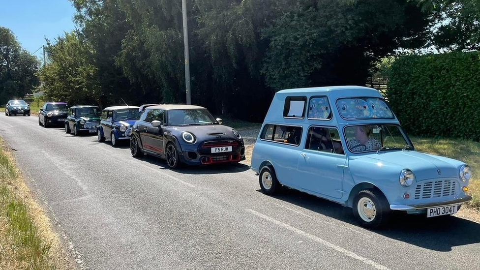 A convoy of mini's led by Charlie's new mini van