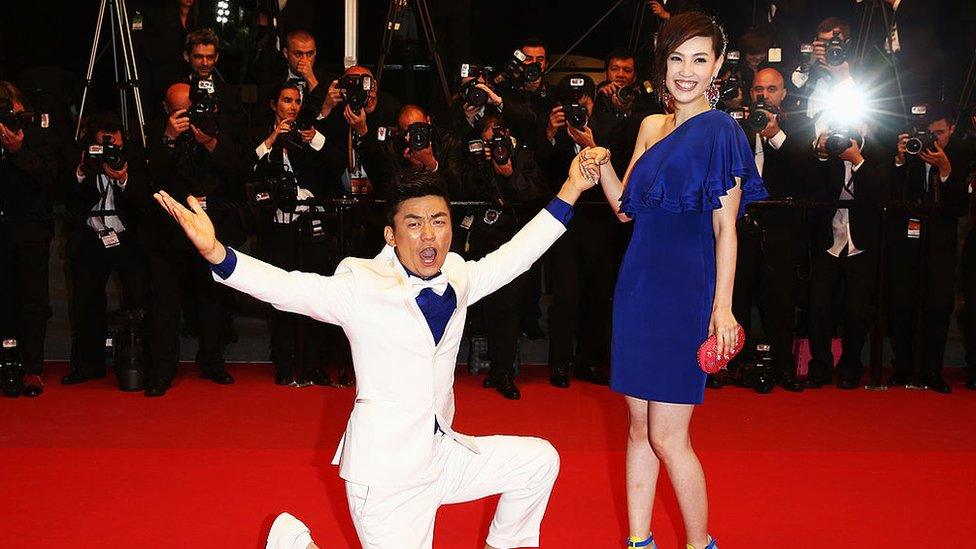 Actor Baoqiang Wang and Ma Rong attend the Premiere of 'Tian Zhu Ding' (A Touch of Sin)