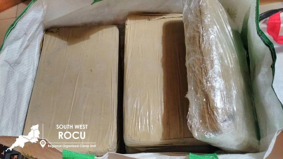 Three large white bricks of wrapped powder