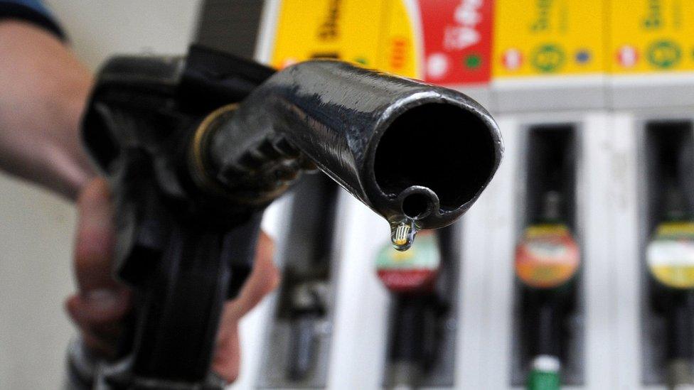 Close-up of fuel nozzle at petrol pump