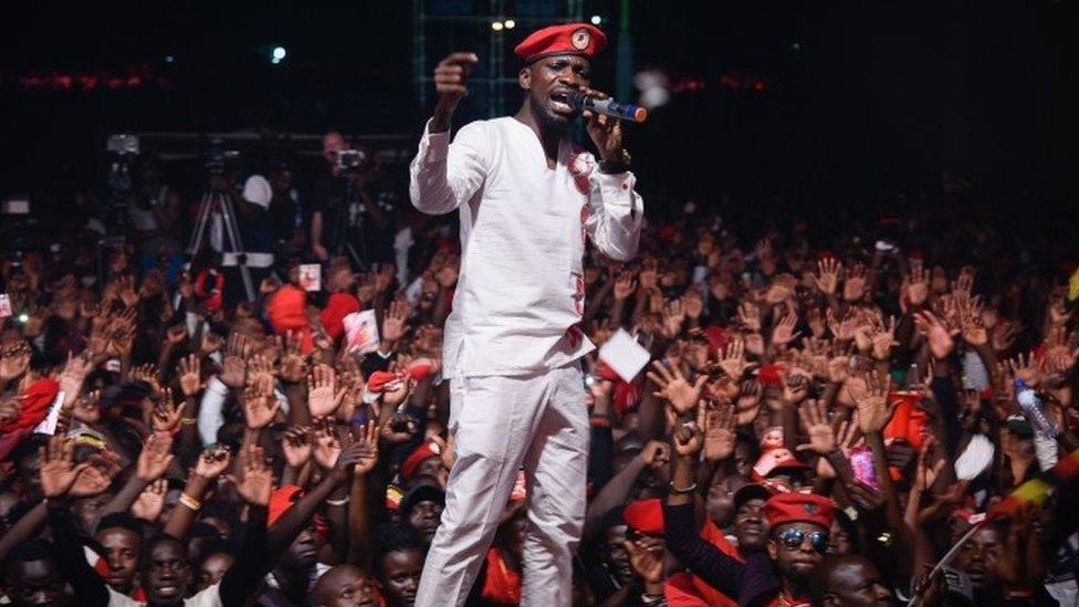 Bobi Wine appears on stage on the outskirts of Kampala