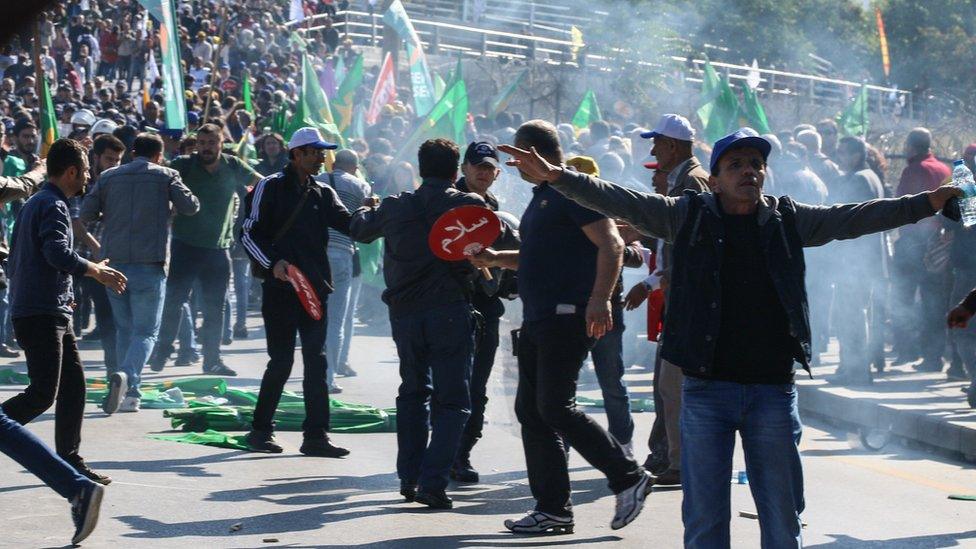 Crowds disperse following the bombings