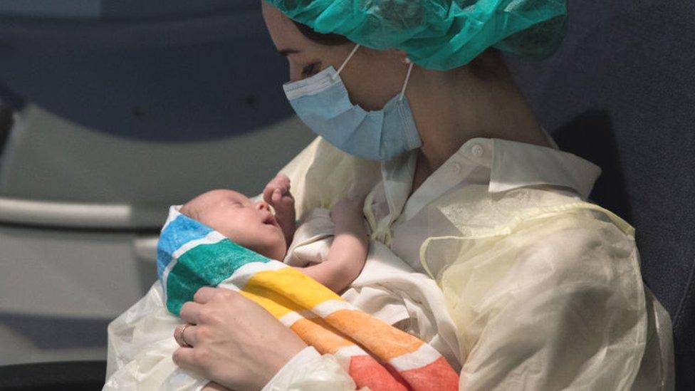 Italian mother and baby in Bologna, April 2020