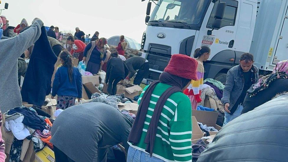 Villagers at a refugee camp receiving the Turkey earthquake aid