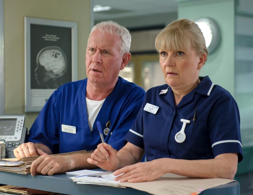 Promotional still from BBC medical drama Casualty showing Derek Thompson as Charlie Fairhead