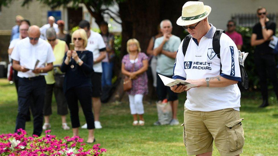 Fans at Justin Edinburgh service