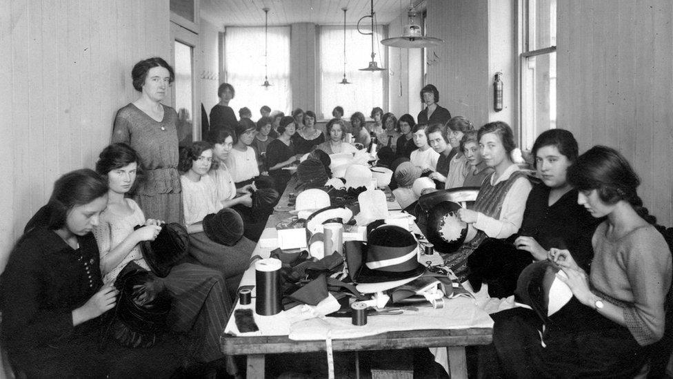 Carlton & Prior, 168 Aldersgate: cutting and sewing room. Edith Graydon is 5th on left