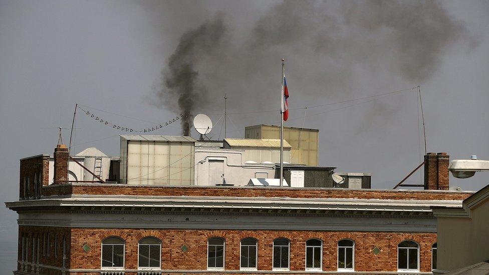 Black smoke billows from a chimney on the Russian consulate, September 1, 2017 in San Francisco, California